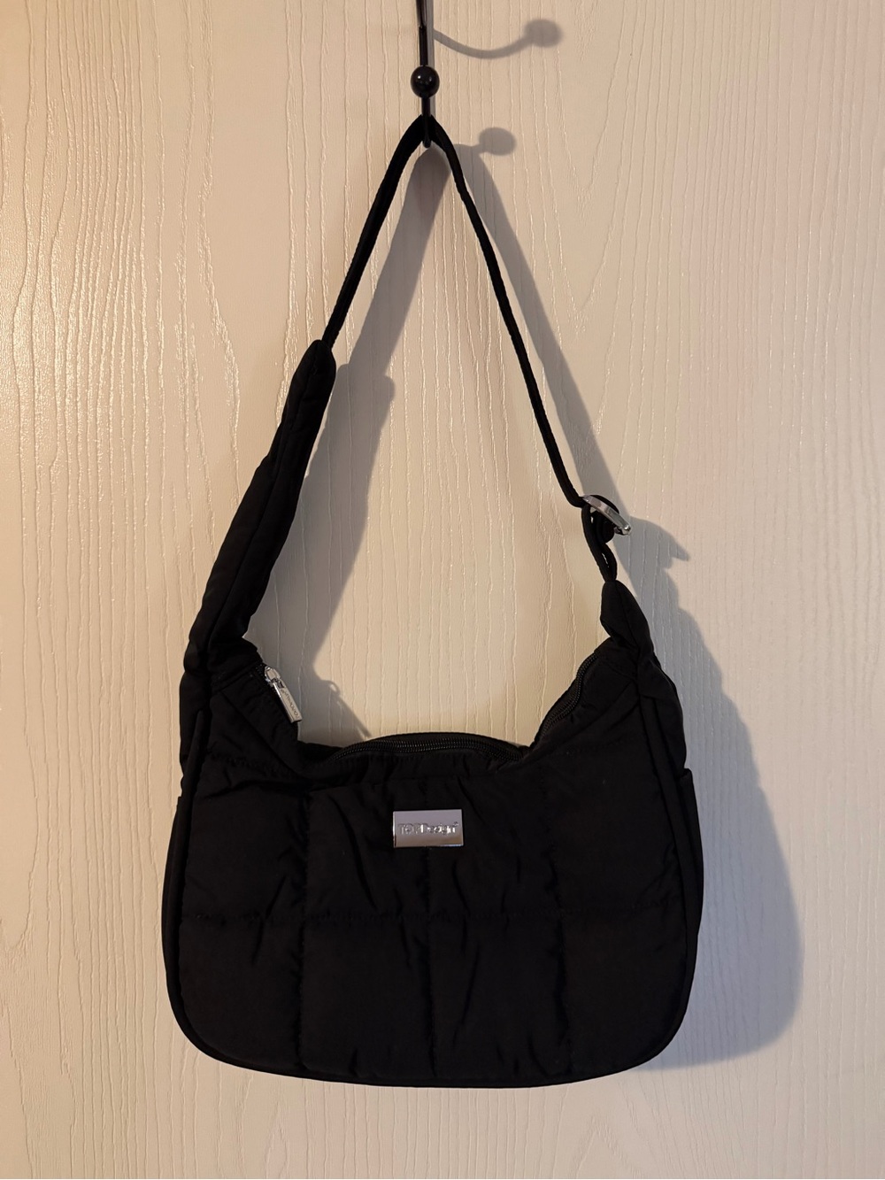Black Puffer Crecent Shoulder Bag by TOPDesign